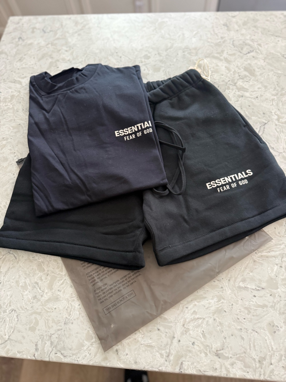 Fear of God ESSENTIALS  Black Cotton Joggers with White Logo